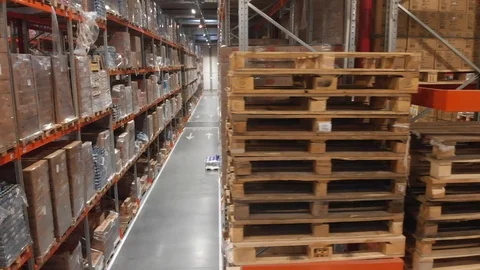 Warehouse with cardboard boxes inside on pallets racks, logistic center. Vídeos de archivo 126270119
