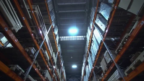 Warehouse with cardboard boxes inside on pallets racks, logistic center. Dynamic Stock Footage 171258488