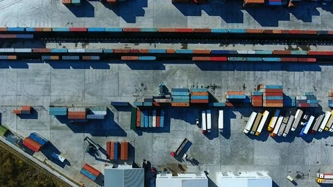 Warehouse with containers. Container Handler unload the train. aerial view Stock-Footage 97532574