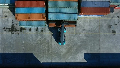 Warehouse with containers. Container Handler unload the train. aerial view Stock Footage 97532703