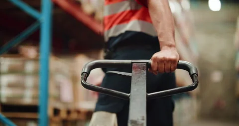 Warehouse, delivery and hands with pallet truck, loader and restock for goods Video stock 326094934