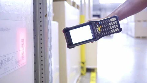 Warehouse employee using barcode scanner device closeup Stock Footage 248646246