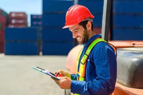 Warehouse engineer working at container yard Stock Photos