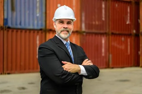 Warehouse engineer working at container yard Stock Photos