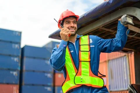 Warehouse engineer working at container yard Stock Photos