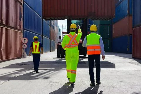 Warehouse engineer working at container yard Stock Photos