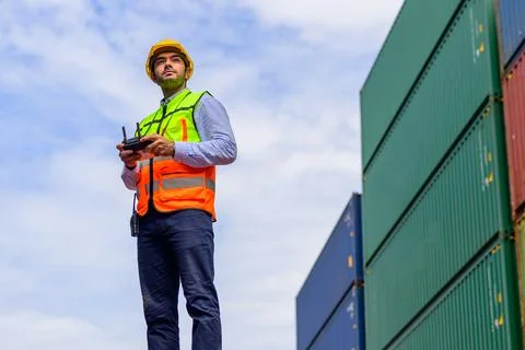 Warehouse engineer working at container yard Stock Photos