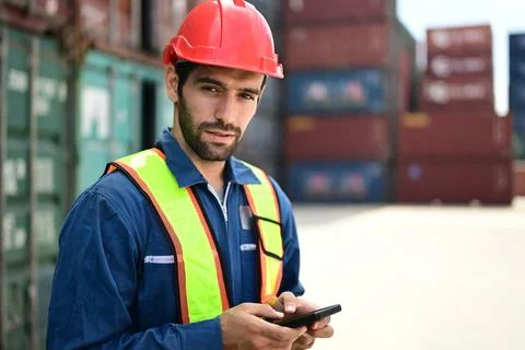 Warehouse engineer working at container yard Stock Photos