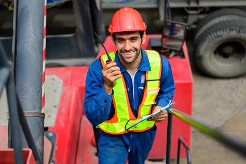 Warehouse engineer working at container yard Stock Photos