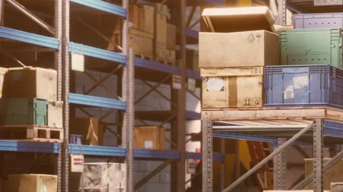 Warehouse filled with boxes and crates organized on metal shelves Stock Footage 340608068