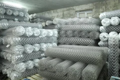 Warehouse filled with rolls of mesh netting Stock Photos