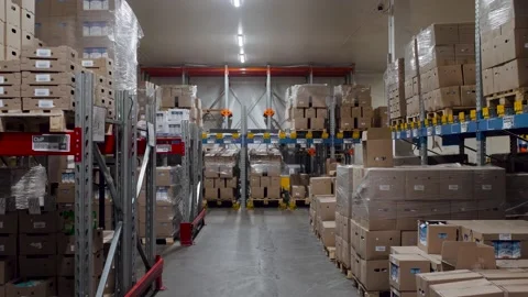 Warehouse. Flights with cardboard boxes. A modern food warehouse. Video stock 138595885