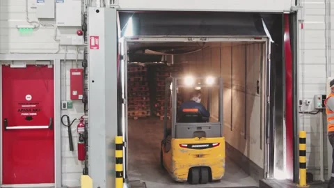 Warehouse Forklift Driver Loading with boxes Preparing orders Deposit Interior Vídeo Stock 142134559