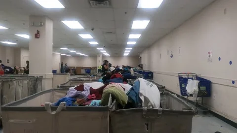 Warehouse full of clothes Stock Footage 156133604