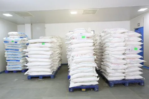 Warehouse full of containers on rack for storage in pharmaceutical Stock Photos