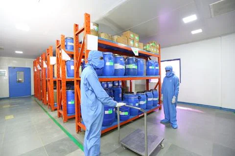 Warehouse full of containers on rack for storage in pharmaceutical Stock Photos
