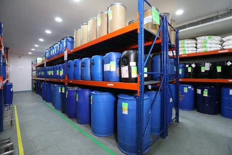 Warehouse full of containers on rack for storage in pharmaceutical Stock Photos