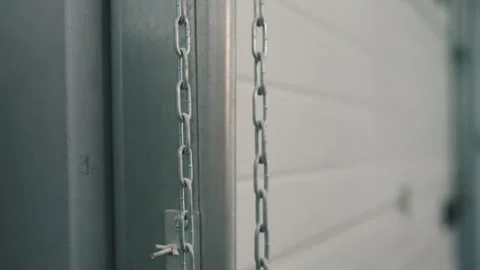 Warehouse gate closes down close-up Stock Footage 145687912