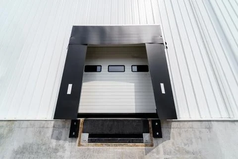 Warehouse gate for loading and unloading cargo in a distributed center Stock Photos