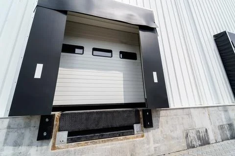 Warehouse gate for loading and unloading cargo in a distributed center Stock Photos