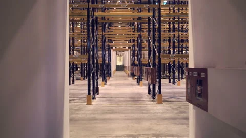 Warehouse, hangar storage racks and shelves industrial logistic delivery.  Stock Footage 98797807