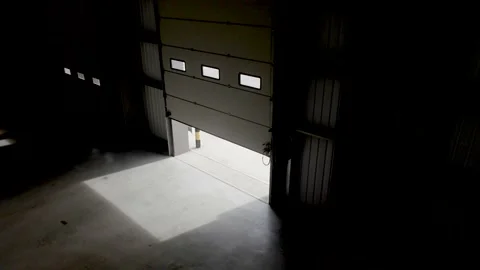 Warehouse Interior Shutter Doors Opening Stock Footage 222460255