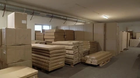 Warehouse Interior with Stacked Flat Pack Furniture Ready for Distribution Stock Footage 313934503