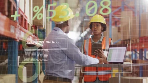 Warehouse lead and staff tapping tablet typing laptop, viewing animated data Stock Footage 333255659