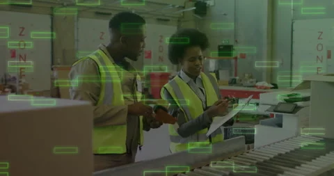 Warehouse lead pointing packing list triggers operator scanning box for sorting Stock Footage 312904719