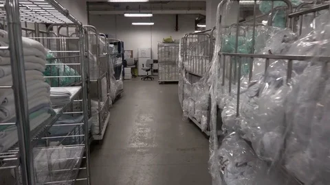 Warehouse with linen supply carts Video stock 77259085