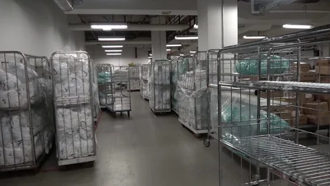Warehouse with linen supply carts Video stock 77259111