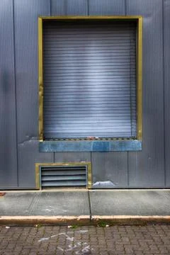 Warehouse loading dock with garage door Stock Photos