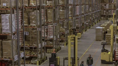 Warehouse long shot, high point. Motion time lapse. UHD 4K Stock Footage 120388991