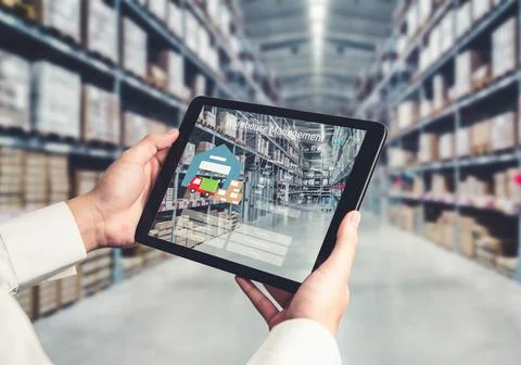 Warehouse management innovative software in computer for real time monitoring Stock Photos