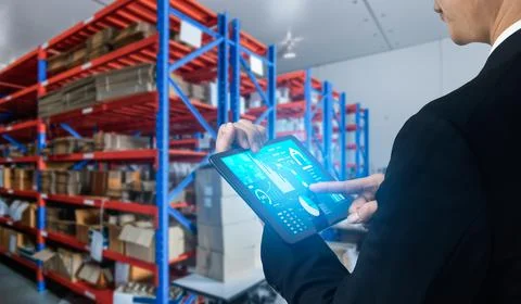 Warehouse management innovative software in computer for real time monitoring Stock Photos