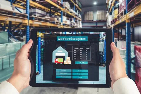 Warehouse management innovative software in computer for real time monitoring Stock Photos