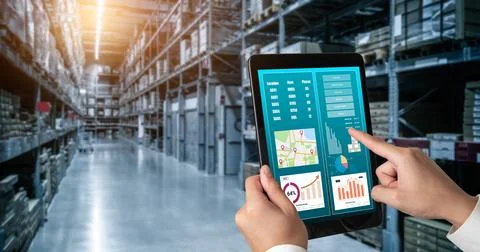 Warehouse management innovative software in computer for real time monitoring Stock Photos