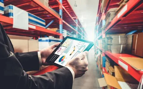 Warehouse management innovative software in computer for real time monitoring Stock Photos