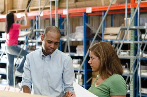 Warehouse manager and employee Stock Photos