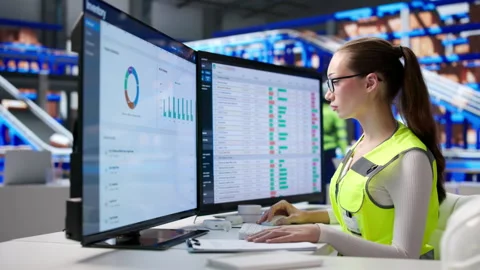 Warehouse Manager Carefully Tracking Stock Levels Stock Footage 345859773