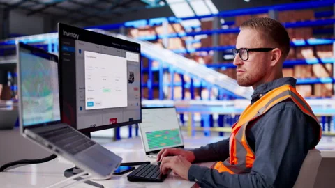 Warehouse Manager Checks Computer Screen Stock Footage 331516650