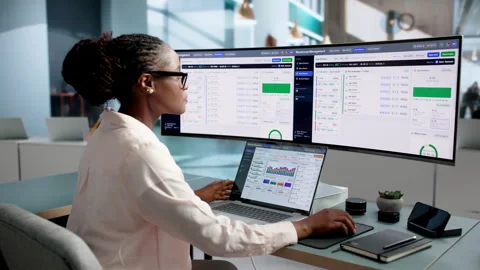 Warehouse Manager Efficiently Using Laptop For Inventory Tracking Stock Footage 345852710
