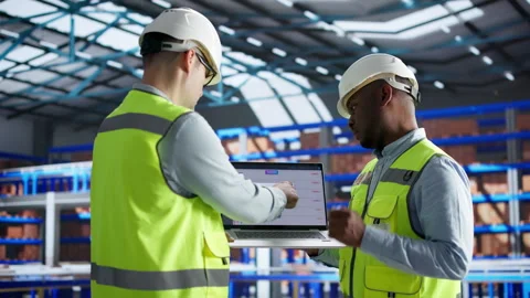 Warehouse Manager Overseeing Real-time Inventory Tracking Stock Footage 345851542