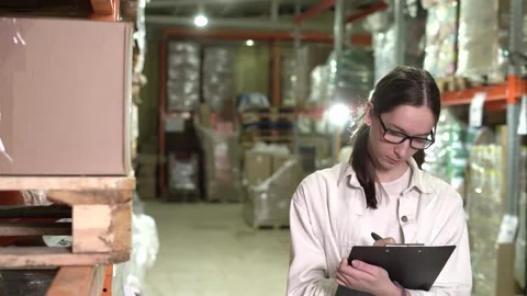 The warehouse manager works. Stock Footage 182037484