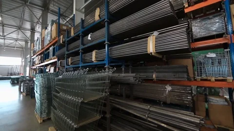 Warehouse of metal profiles . The profile to create the warehouse. metal pipe Stock Footage 94899411