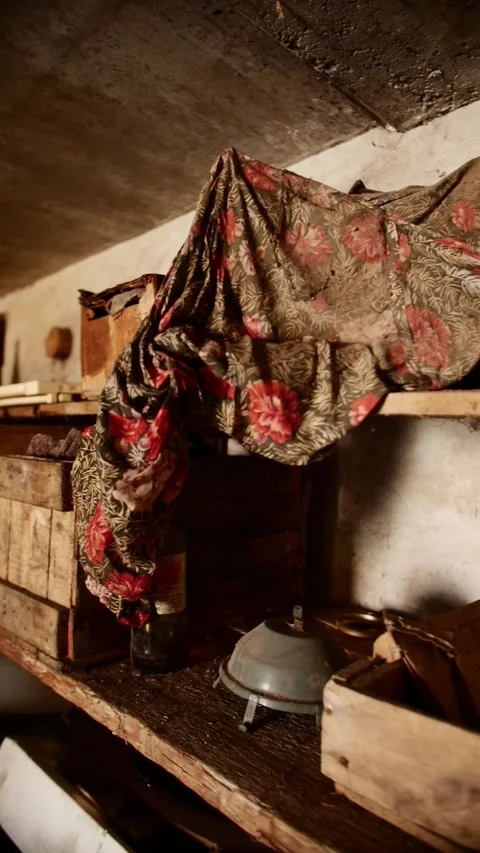 A warehouse of old things and rags in the cobwebs of an old abandoned garage.  Stock Footage 234215241