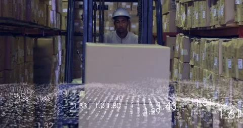 Warehouse operator driving forklift moving one box then adding second numeric Stock Footage 334112170