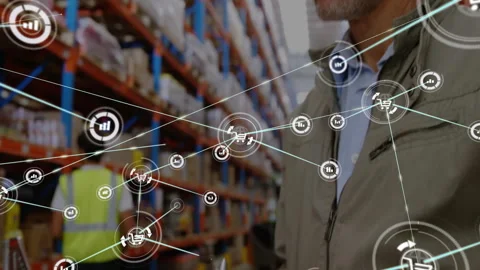 Warehouse operator scanning packages on racks, displaying glowing shopping cart, 動画素材 309106562