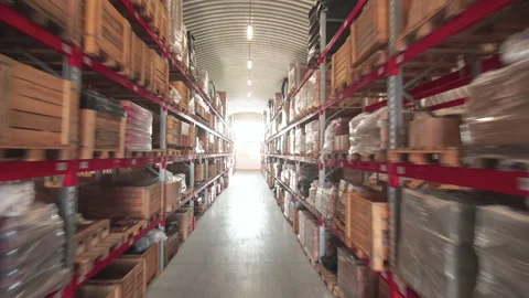 Warehouse or stock of materials, racks, boxes, containers. Shelves with goods or Stock Footage 147676791