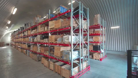 Warehouse or stock of materials, racks, boxes, containers. Shelves with goods or Video stock 147681084
